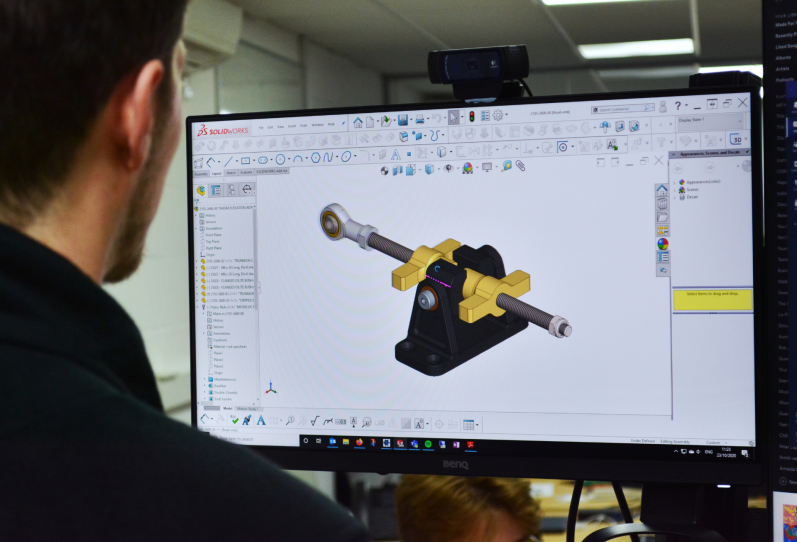 Chess Dynamics - Engineer working on CAD design